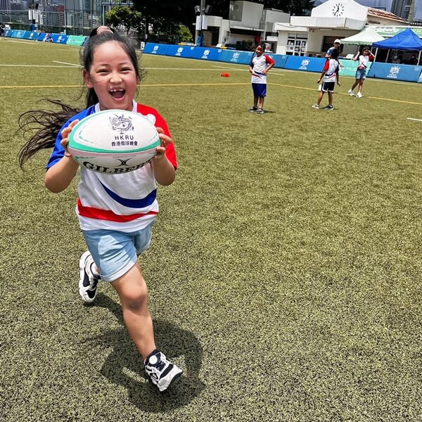 IBEL Girl playing rugby